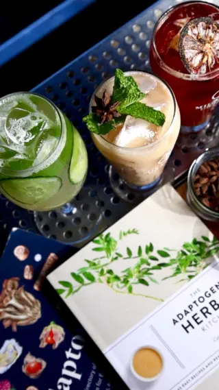 Have you tried one of our refreshing drinks from the Adaptogens Menu? 

BUDDHA JUICE
chamomile infused coconut water, ginger, lime & ashwagandha shrub, cucumber

RUDY’S DATE
rooibos tea, vanilla, date, chai, oat milk, maca, reishi & chaga, cacao

PETAL & ROOT
hibiscus, rose, ginseng & rhodiola tea, smoked lemon, turmeric & black pepper