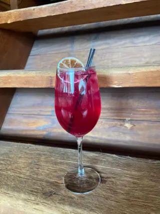 Empress in Bloom is our featured cocktail this week. Stop in and enjoy this delightful blend of Lychee Liquor, elderflower liquor, gin, beet, lime, and brut.