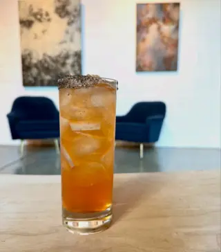 Give our newest cocktail a try! Nocturnal November - Tequila, mezcal, Aperol, lemon, cinnamon apple syrup and a black salt with a sugar rim. ⭐️